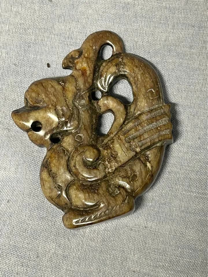 Carved Stone Dragon Pendant